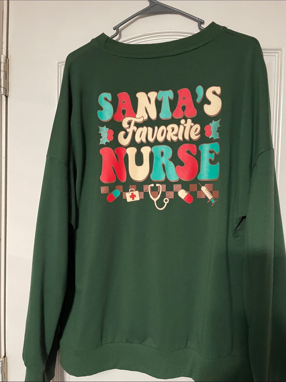 Women’s Green Holiday Sweatshirt with Festive 'RN' Graphic - Picture 2 of 3
